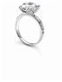 “Delphine” platinum ring with solitaire diamond and pavé diamonds.