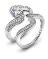 Domino platinum engagement ring and wedding ring