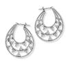 "Contemporary textured hoops in platinum, holding delicate diamonds in prong setting. Code is PTF26