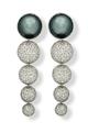 Platinum earrings by Tom Rucker