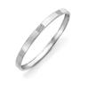 Contemporarily crafted platinum bangle with pave diamonds. Code is PTK4