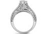 A cathedral like solitaire setting on a beautifully carved platinum ring. Code is PTU114