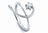 An artistic view of a platinum ring with a prong set solitaire. Code is PTJ103